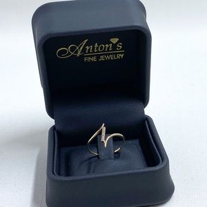 14k yellow gold bypass ring with diamonds